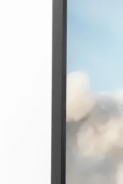 Obraz kolorowy słoń w chmurach rama czarna z aluminium 150x100 cm